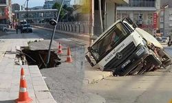 Ağır hasarlı binanın önündeki yol çöktü, temizlik aracı çukura düştü