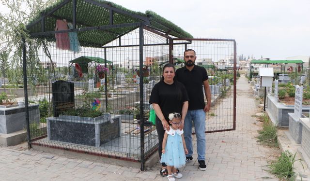 Ölen kızlarının hatıraları çalınınca mezarının etrafını çitle çevirip, kapı yerleştirdiler