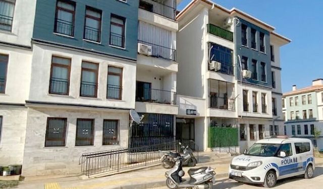 Evinde tabancayla vurulmuş halde bulunan kadını, bina görevlisi öldürmüş